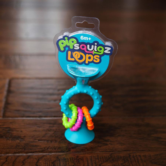 Прорізувач-брязкальце на присосках Fat Brain Toys pipSquigz Loops (бірюзовий)