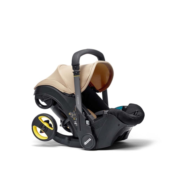 Автокресло Doona i Infant Car Seat (Sahara Sand) - фото | Интернет-магазин автокресел, колясок и аксессуаров для детей Avtokrisla